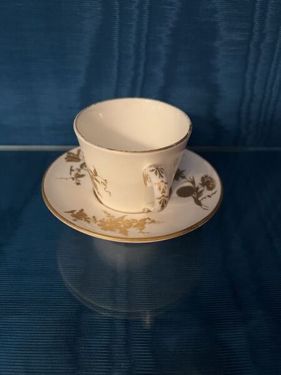 SÈVRES.
Sunken porcelain goblet and saucer...