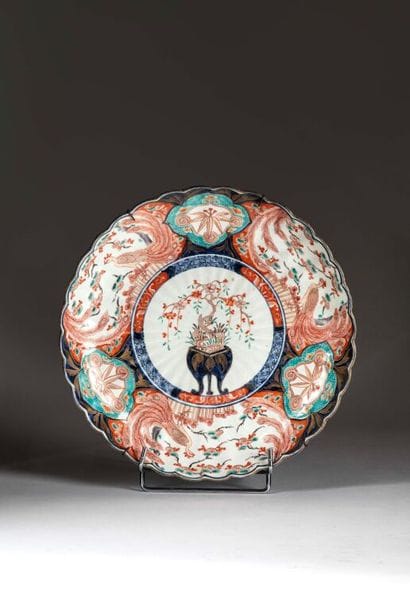 JAPAN.
Porcelain scalloped circular bowl...