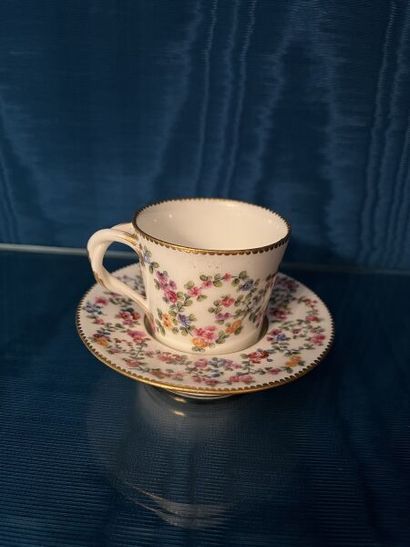 SÈVRES.
Sunken porcelain goblet and saucer...