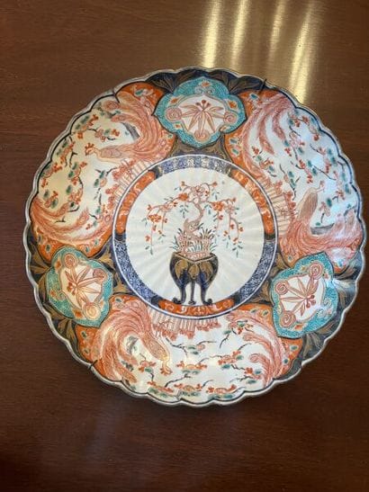 JAPAN.
Porcelain scalloped circular bowl...