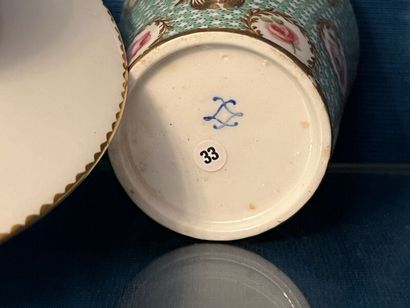 SÈVRES.
Sunken porcelain goblet and saucer...