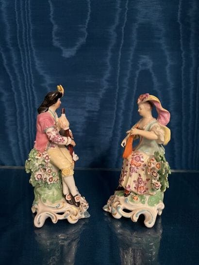ENGLAND.
Two porcelain pendant groups depicting...