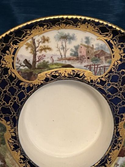SÈVRES.
Sunken porcelain goblet and saucer...