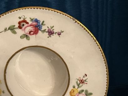 SÈVRES.
Sunken porcelain goblet and saucer...