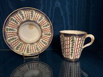 SÈVRES. 
Sunken porcelain goblet and saucer...