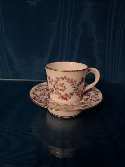 SÈVRES.
Sunken porcelain goblet and saucer...