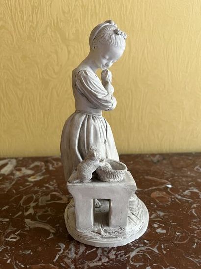 In the Sèvres style. 
Terra cotta statuette...