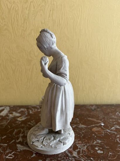 In the Sèvres style. 
Terra cotta statuette...
