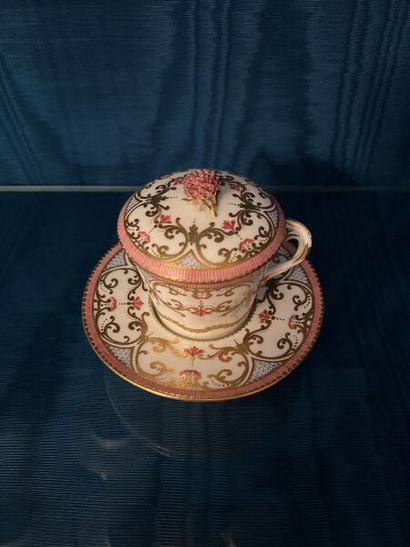 SÈVRES.
Sunken porcelain goblet and saucer...