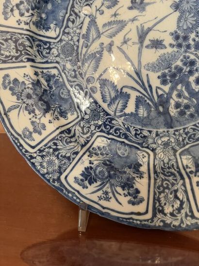 DELFT.
Large round earthenware dish with...