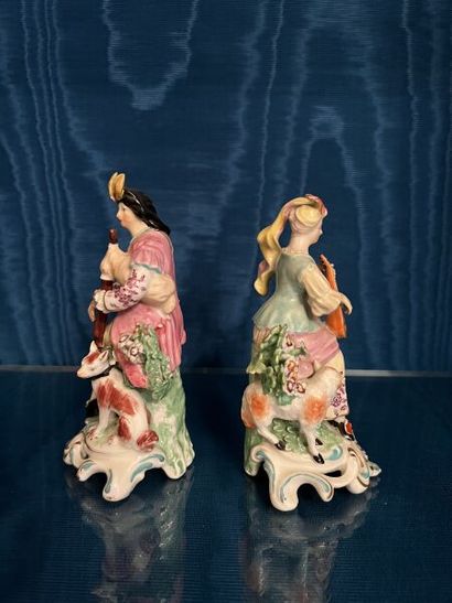 ENGLAND.
Two porcelain pendant groups depicting...