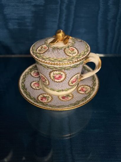 SÈVRES.
Sunken porcelain goblet and saucer...