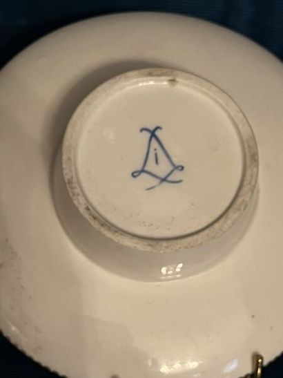 SÈVRES.
Sunken porcelain goblet and saucer...