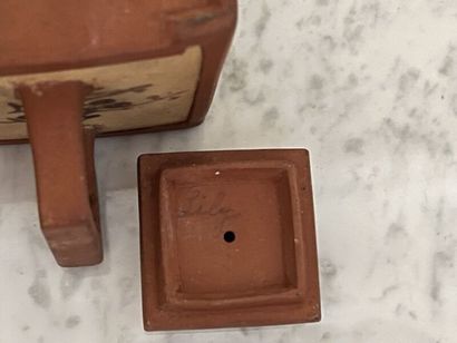 CHINA.
Pair of small teapots in brown tinted...