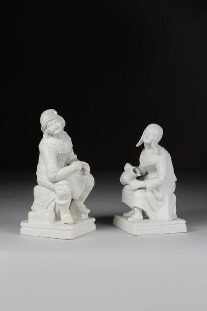 Two porcelain cookie pendant groups depicting...