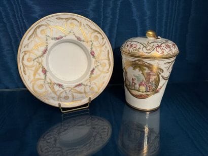 PARIS.
Porcelain trembleuse covered cup and...