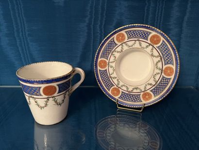 SÈVRES.
Sunken porcelain goblet and saucer...