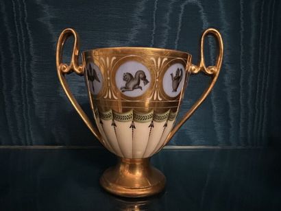 PARIS.
Porcelain goblet with handles and...