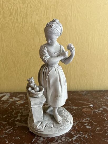 In the Sèvres style. 
Terra cotta statuette...
