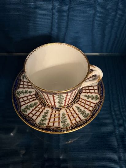 SÈVRES. 
Sunken porcelain goblet and saucer...