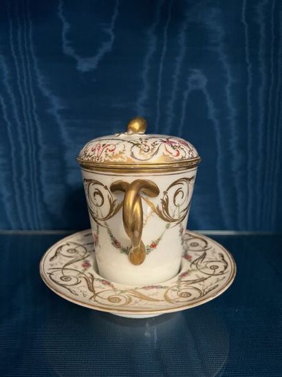 PARIS.
Porcelain trembleuse covered cup and...