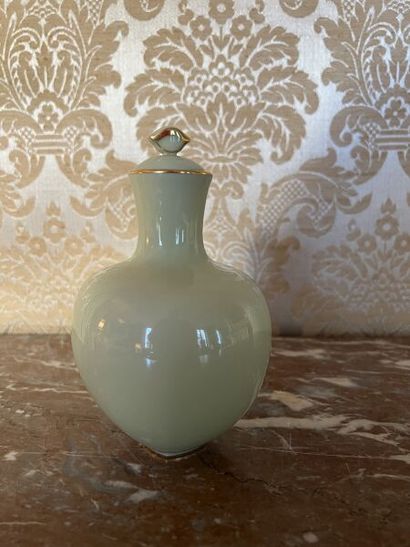 SÈVRES.
Porcelain bottle vase and slightly...