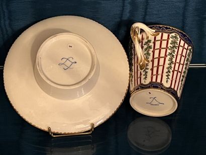 SÈVRES. 
Sunken porcelain goblet and saucer...