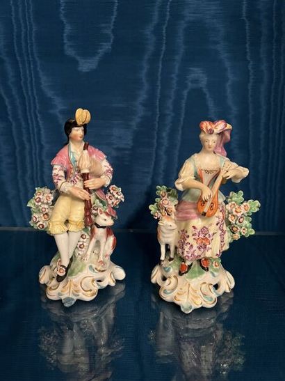 ENGLAND.
Two porcelain pendant groups depicting...
