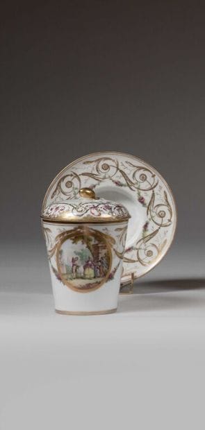 PARIS.
Porcelain trembleuse covered cup and...