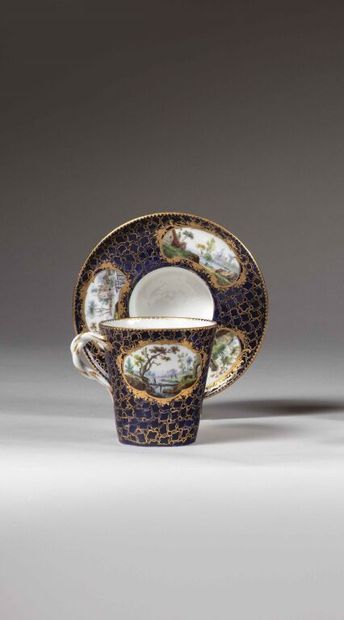 SÈVRES.
Sunken porcelain goblet and saucer...