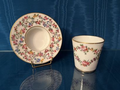 SÈVRES.
Sunken porcelain goblet and saucer...