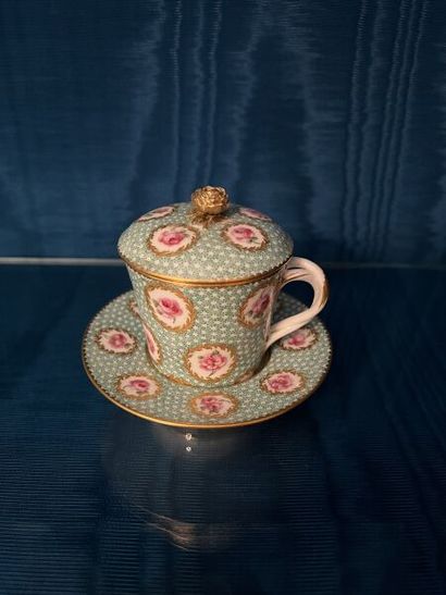 SÈVRES.
Sunken porcelain goblet and saucer...