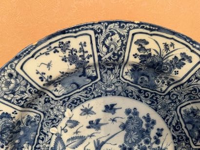 DELFT.
Large round earthenware dish with...