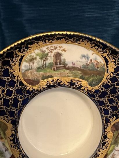 SÈVRES.
Sunken porcelain goblet and saucer...