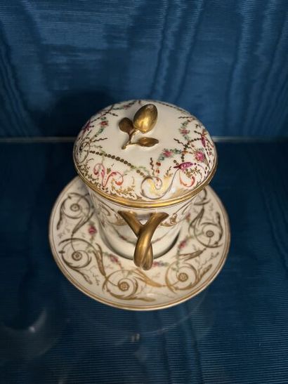 PARIS.
Porcelain trembleuse covered cup and...