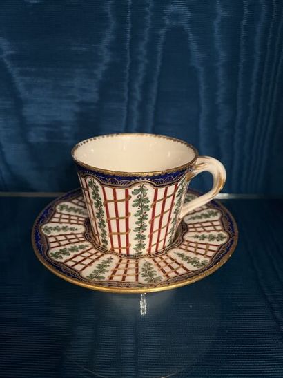 SÈVRES. 
Sunken porcelain goblet and saucer...