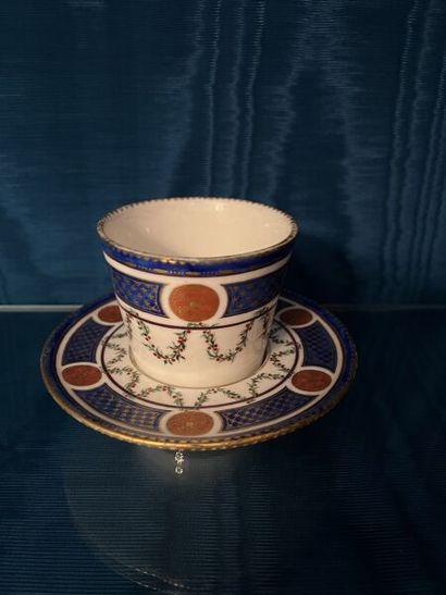 SÈVRES.
Sunken porcelain goblet and saucer...
