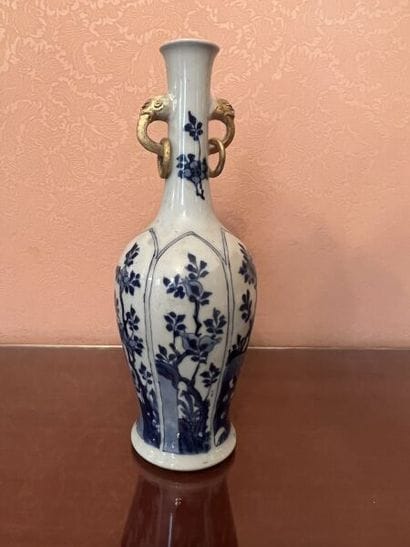 CHINA.
Porcelain bottle vase with blue monochrome...