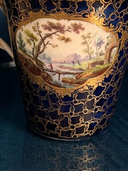 SÈVRES.
Sunken porcelain goblet and saucer...