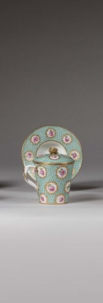 SÈVRES.
Sunken porcelain goblet and saucer...