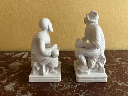 Two porcelain cookie pendant groups depicting...