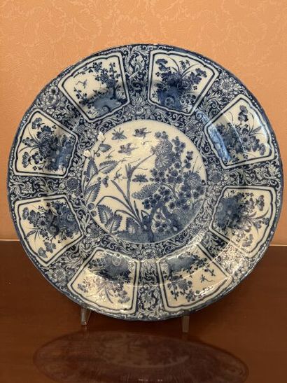 DELFT.
Large round earthenware dish with...