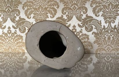 Contemporary school. 
Brown glazed porcelain...
