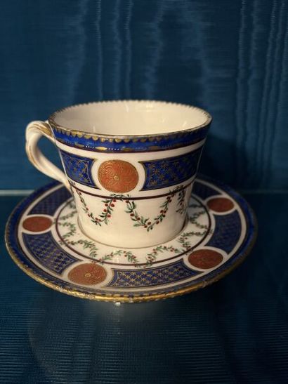 SÈVRES.
Sunken porcelain goblet and saucer...