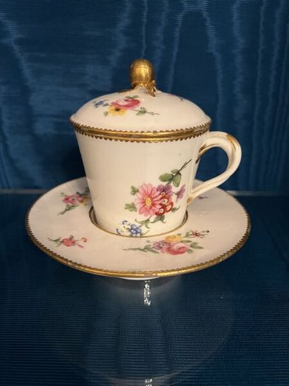 SÈVRES.
Sunken porcelain goblet and saucer...