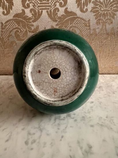 CHINA.
Porcelain bottle vase with green monochrome...