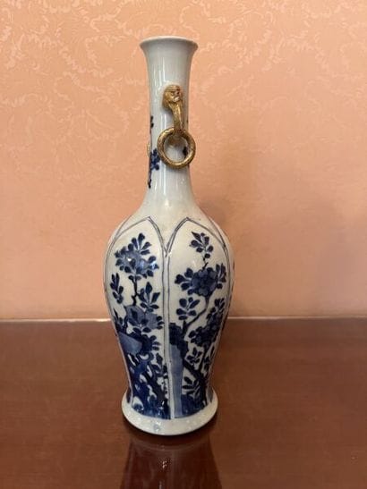 CHINA.
Porcelain bottle vase with blue monochrome...