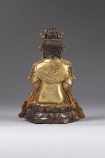 CHINE.
Statuette de divinité en bronze représenté...