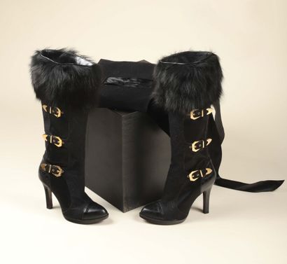 * LOUIS VUITTON.
Paire de bottes noires,...