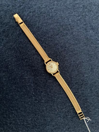 JUVENIN.
Montre de dame en or jaune 750 ‰,...
